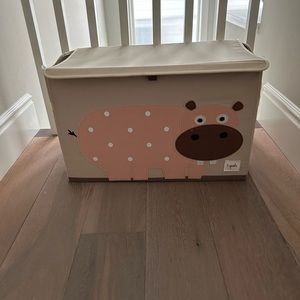 Kids storage bin, 25” long by 15” high.